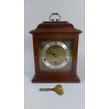 A Mid/Late 20th Century Westminster Chime Mantel Clock in Mahogany Case by Elliott. The Movement