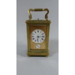 A French Brass Cased Carriage Clock with White Enamel Dial inscribed Paul Garnier. Subsidiary