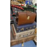 A Travelling Trunk, Two Suitcases and a Briefcase