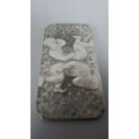 An Oriental Rectangular White Metal Ingot Slab Cast in Relief with Figures, Flowers and Character