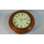 A Reproduction Circular Oak Framed Wall Clock the Dial Inscribed Fretwell, Doncaster, Pendulum