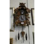 A Reproduction Wall Hanging Cuckoo Clock