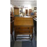 An Edwardian Oak Two Drawer Fall Front Bureau, 74cm Wide