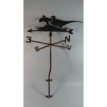 A Fret Cut Metal Weather Vane Decorated with Cock Pheasants on Tubular Wall Mounting Support