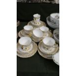 A Collection of Royal Stafford Gilt Decorated Teawares to Include Six Trios, Cake Plate and Cream