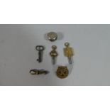 A Collection of Three Vintage Pocket Watch Keys and a Pro Patria Badge