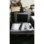 A Flat Screen TV and Two DVD Players
