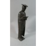 A Heavy Cast Metal Figural Study of School Master Reading Book, 29cm High