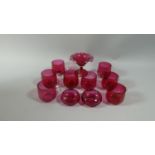 A Collection of Cranberry Glass to Include Eight Custards, Two Pin Dishes and a Vase