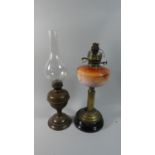 A Late 19th Century Copper Oil Lamp Together with a Brass Oil Lamp with Coloured Glass Reservoir