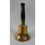 A Polished Bronze Handbell, 23cm High