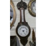 A Late Victorian Oak Cased Presentation Onion Topped Wheel Aneroid Barometer with Temperature Scale,