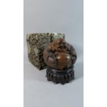 A Patinated Bronze Oriental Study of Seated Laughing Buddha on Carved Wooden Stand Together with