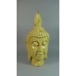 A Large Yellow Glazed Ceramic Bust of Buddha, 49cm High