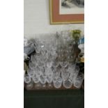 A Large Collection of Various Cut Glass Wines, Sherries, Brandy Balloons, Etched Glassware, Jugs,