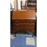 A Mahogany Fall Front Bureau with Fitted Interior and Three Drawers to Base, Claw and Ball Feet,