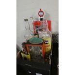 A Tray of Advertising Items to Include 4x4.5lt Whisky Bottles, Embassy Glassware, Tobacco Tins,