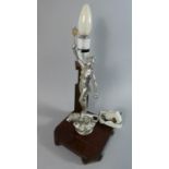 A Novelty Figural Table Lamp in the Form of Maiden Standing on Lion with Star in Hand, 33cm High