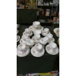 A Collection of Paragon China Teawares to Include Eight Trios, Two Cream Jugs, Two Sugar Bowls,