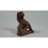 A Carved Wooden Netsuke in the Form of Growling Tiger Upon Rock, 6cm High