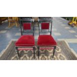 A Pair of Late 19th Century Ebonised Side Chairs with Red Velvet Upholstered Seats and Backs