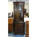 A Mahogany Bow Fronted Double Free Standing Corner Cabinet