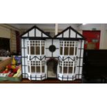 A Vintage Two Bedroom Detached Half Timbered Doll's House. 95x54x87cms High with Carrying Handles.