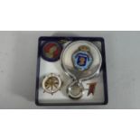 A RMS Queen Mary Enamelled Badge in the Form of Ships Wheel, Royal Visit to Liverpool Enamel