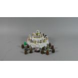 A Collection of Various Vintage and Souvenir Thimbles and Stepped Thimble Stand