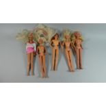 A Small Collection of Two Barbie Dolls and Three Sandy Dolls