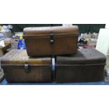 A Set of Three Scumble Glazed Metal Travelling Trunks