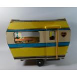 An Unboxed Cindy Caravan in Yellow Blue and White. Minor Damage. 48cms Long.