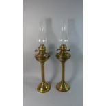 A Pair of Tall Brass Oil Lamps with Glass Chimneys, Lamps 48cm High