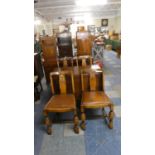A Mid 20th Century Oak Dining Room Suite Comprising Drop Leaf Table and Four Hide Seated Chairs