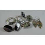 A Collection of Mexican Silver and Paua Shell Pendants and Earrings