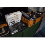 A Collection of Various Battery Chargers, Rechargable Batteries, DVD Player, Digital Picture Frame