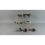 A Collection of Britains and Other Farmyard Animals and Carts
