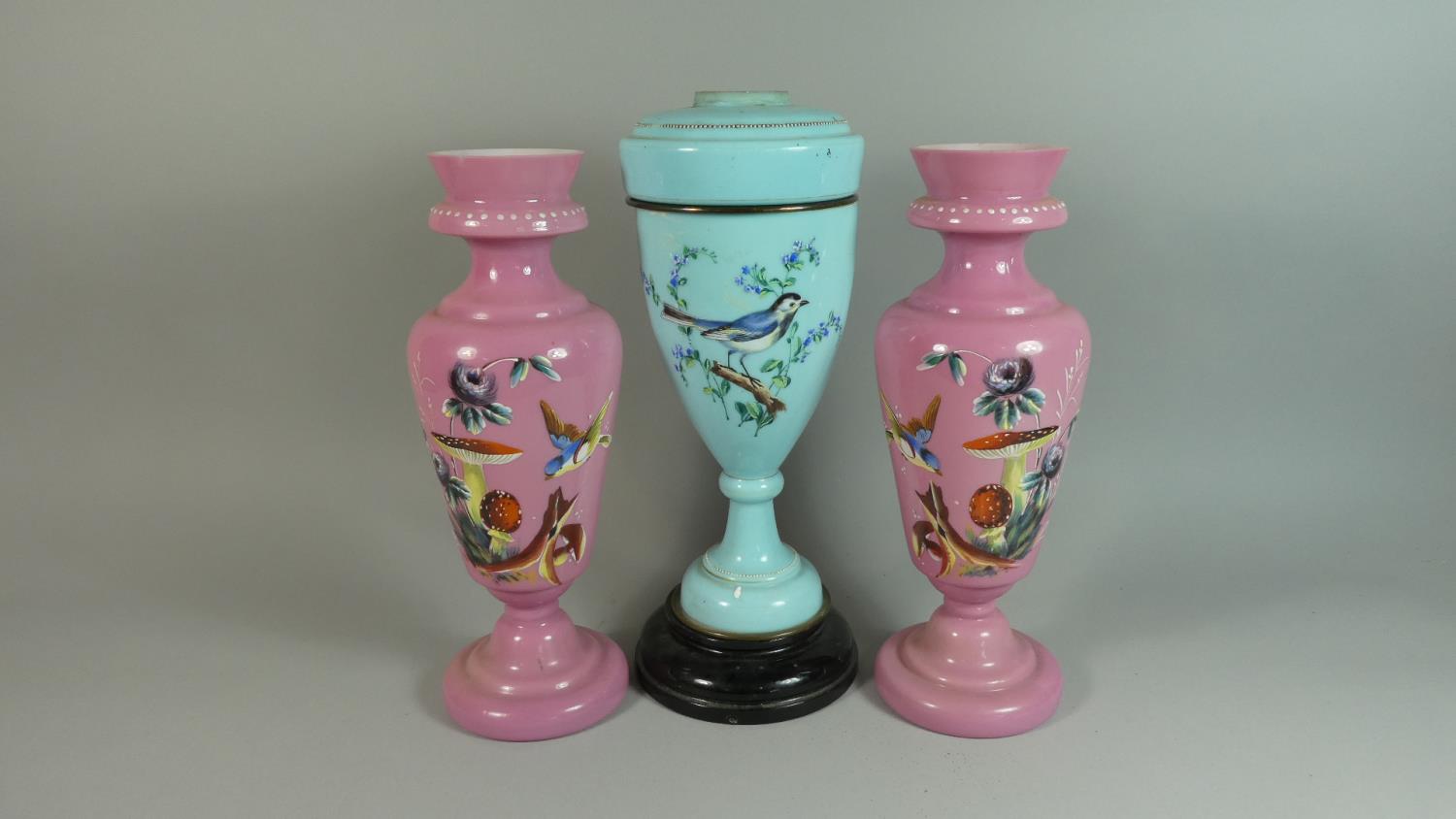 A Pair of Opaque Pink Glass Vases with Floral and Bird Decoration, 36cm High Together with an Opaque