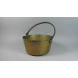 A Brass Jam Kettle with Loop Handle, 29cm Diameter