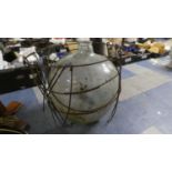 A Vintage Glass Carboy in Metal Protector, 46cm High