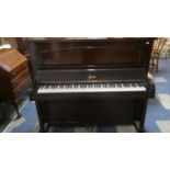 A Mahogany Cased Upright Piano by Ryalls