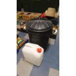 A Plastic Bin, Water Carrier and Soda Stream