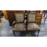 An Edwardian Oak Framed Gents Armchair with Matching Ladies Nursing Chair