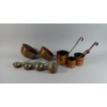 A Collection of Three Copper Milk Warmers, Two Copper Colanders and Four Graduated Copper