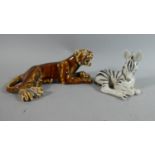 Two Russian Ceramic Animal Figures, Recumbent Lion and Recumbent Zebra