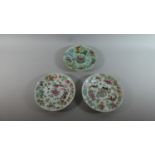 A Pair of Chinese Plates with Applied Decoration Depicting Flowers, Birds, Butterflies and Fruit