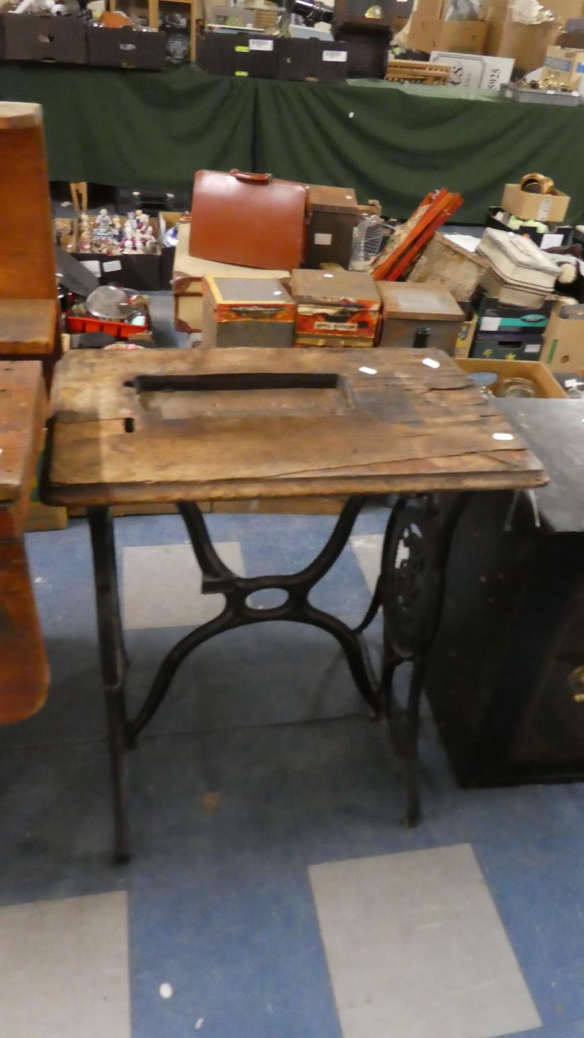 A Cast Iron Singer Treadle Sewing Machine Table Frame, 64cm Wide