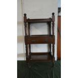 A Late Victorian Mahogany Three Tier Buffet with Galleried Top, Centre Drawer and Casters, 59cm Wide