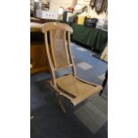A Folding Cane Seated and Backed Late Victorian Nursing Chair