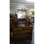 A Late Victorian Walnut Dressing Chest of Two Short and Two Long Drawers with Raised Jewel Drawers